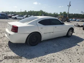 2006 Dodge Charger z VIN 2B3KA43G06H502230, wystawiony jako Copart lot #57057535 z przebiegiem 135 230 mil mil oraz Szkoda całkowita • Salvage title. Historia ofert i sprzedaży dostępna na DreamBid. Obrazek 3.