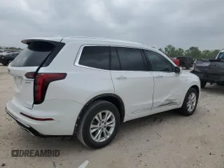 2024 Cadillac XT6 FWD Luxury with VIN 1GYKPAR47RZ720446, listed as a Copart auction lot 51762695 with 10,728 mi miles and Salvage Title. Bid and sale history available at carsss.com. Image 3.