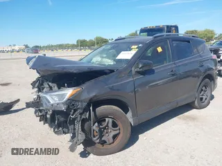 2018 Toyota RAV4 LE with VIN JTMZFREV7JJ207270, listed as a IAAI auction lot 41853828 with 89,179 mi miles. Bid and sale history available at carsss.com. Image 2.