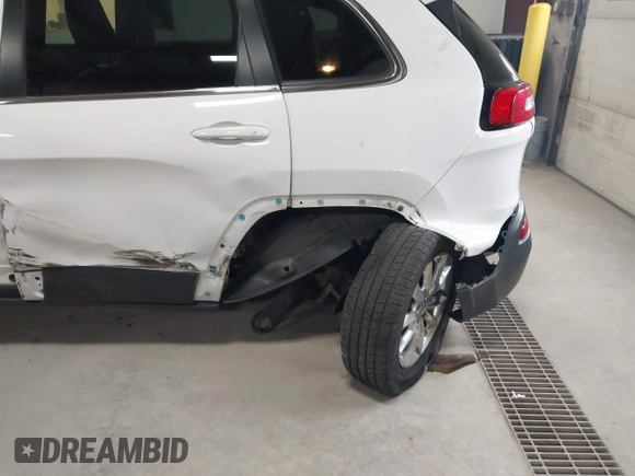 2014 Jeep Cherokee Limited with VIN 1C4PJMDS1EW235980, listed as a IAAI auction lot 41994044 with 128,292 mi miles and . Bid and sale history available at DreamBid. Image 6.