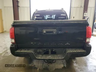 2019 Toyota Tacoma SR z VIN 5TFCZ5AN1KX196812, wystawiony jako Copart lot #51372065 z przebiegiem Nie podano mil oraz Szkoda całkowita • Salvage title. Historia ofert i sprzedaży dostępna na DreamBid. Obrazek 6.