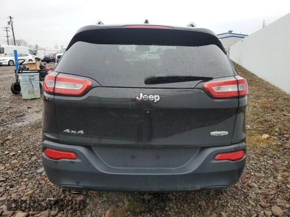 2015 Jeep Cherokee Latitude with VIN 1C4PJMCBXFW504433, listed as a Copart auction lot 52767515 with 141,969 mi miles and Clean Title. Bid and sale history available at carsss.com. Image 6.
