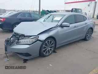 2015 Acura TLX V6 Tech with VIN 19UUB2F54FA020816, listed as a IAAI auction lot 41600870 with 76,055 mi miles. Bid and sale history available at carsss.com. Image 2.