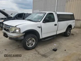 2002 Ford F-150 XL z VIN 1FTRF18W22NA37948, wystawiony jako Copart lot #66753704 z przebiegiem 99 806 mil mil oraz Nie do naprawy • Non repairable. Historia ofert i sprzedaży dostępna na DreamBid. Obrazek 1.
