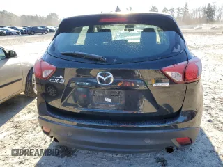2016 Mazda CX-5 Sport with VIN JM3KE2BE1G0629430, listed as a Copart auction lot 82442654 with 130,289 mi miles and Salvage Title. Bid and sale history available at DreamBid. Image 6.