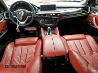 2015 BMW X6 xDrive50i with VIN 5UXKU6C51F0F94180, listed as a Copart auction lot 55306944 with 98,590 mi miles and Salvage Title. Bid and sale history available at carsss.com. Image 8.