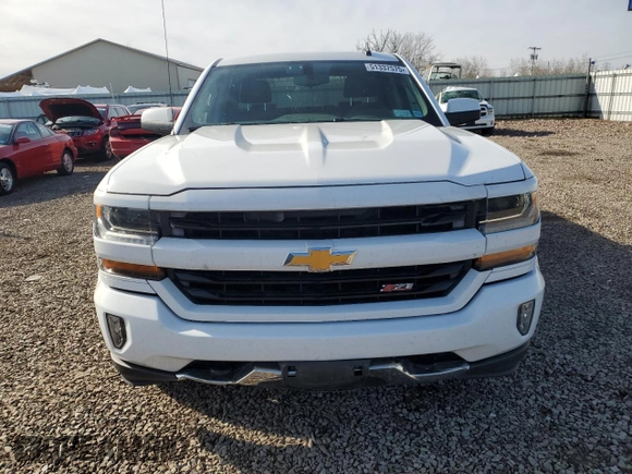 2017 Chevrolet Silverado 1500 LT with VIN 3GCUKREC7HG170799, listed as a Copart auction lot 51337575 with 115,851 mi miles and Salvage Title. Bid and sale history available at DreamBid. Image 5.