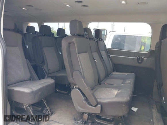 2021 Ford Transit Passenger XL with VIN 1FBAX2Y88MKA13051, listed as a IAAI auction lot 42173862 with 73,507 mi miles. Bid and sale history available at carsss.com. Image 8.