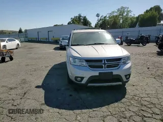 2012 Dodge Journey SXT z VIN 3C4PDDBG0CT293331, wystawiony jako Copart lot #62602995 z przebiegiem 185 605 mil mil oraz Szkoda całkowita • Salvage title. Historia ofert i sprzedaży dostępna na DreamBid. Obrazek 14.