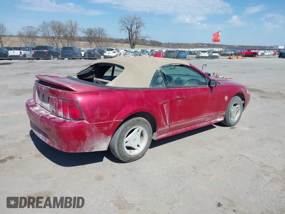 1999 Ford Mustang with VIN 1FAFP4445XF193138, listed as a IAAI auction lot 41716629 with 124,477 mi miles and . Bid and sale history available at DreamBid. Image 4.