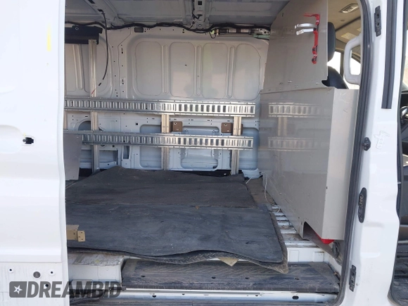 2020 Ford Transit Cargo with VIN 1FTBR2Y80LKA74788, listed as a IAAI auction lot 41939473 with 130,327 mi miles and . Bid and sale history available at DreamBid. Image 8.
