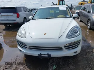 2014 Porsche Cayenne with VIN WP1AA2A21ELA94214, listed as a IAAI auction lot 42389334 with 114,276 mi miles and . Bid and sale history available at DreamBid. Image 12.