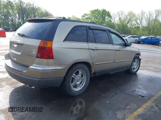 2005 Chrysler Pacifica Touring with VIN 2C8GF68465R252922, listed as a IAAI auction lot 42061282 with 134,543 mi miles and . Bid and sale history available at DreamBid. Image 4.