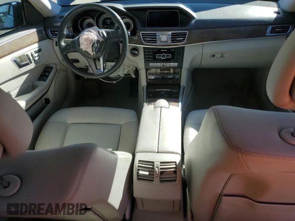2014 Mercedes-Benz E 350 Sport with VIN WDDHF5KB6EA969855, listed as a Copart auction lot 49295495 with 63,898 mi miles and Salvage Title. Bid and sale history available at DreamBid. Image 8.
