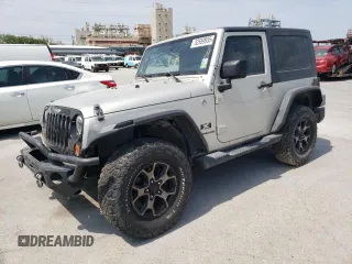 2007 Jeep Wrangler X z VIN 1J4FA24107L128800, wystawiony jako Copart lot #52559955 z przebiegiem 146 806 mil mil oraz Szkoda całkowita • Salvage title. Historia ofert i sprzedaży dostępna na DreamBid. Obrazek 1.