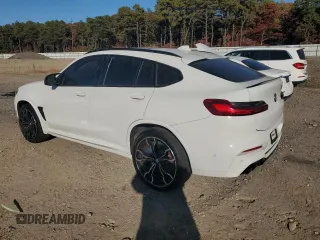 2021 BMW X4 M z VIN 5YMUJ0C00M9E94527, wystawiony jako Copart lot #69607414 z przebiegiem Nie podano mil oraz Szkoda całkowita • Salvage title. Historia ofert i sprzedaży dostępna na DreamBid. Obrazek 2.