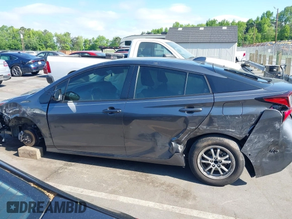 2022 Toyota Prius L Eco z VIN JTDKAMFU5N3188480, wystawiony jako IAAI lot #42146176 z przebiegiem 35 554 mil mil oraz . Historia ofert i sprzedaży dostępna na DreamBid. Obrazek 15.