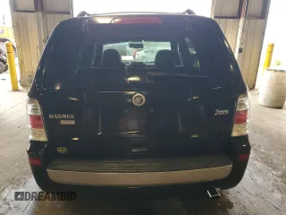 2010 Mercury Mariner Premier with VIN 4M2CN9HG3AKJ25675, listed as a Copart auction lot 64546635 with 99,620 mi miles and Salvage title. Bid and sale history available at DreamBid. Image 6.