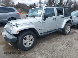 2008 Jeep Wrangler Unlimited Sahara with VIN 1J4GA59158L501099, listed as a IAAI auction lot 41743590 with 213,941 mi miles and . Bid and sale history available at DreamBid. Image 2.