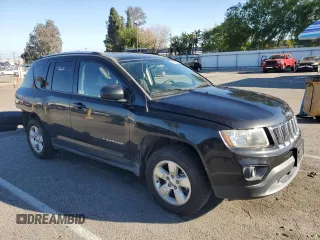 2015 Jeep Compass Sport with VIN 1C4NJCBA1FD190757, listed as a Copart auction lot 46546335 with 104,060 mi miles and Salvage Title. Bid and sale history available at carsss.com. Image 4.