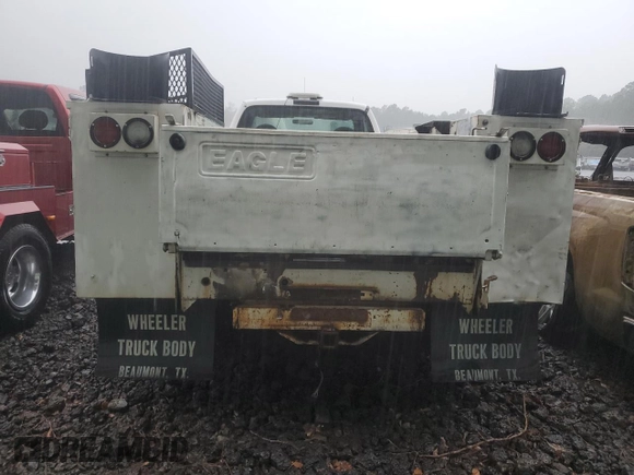 2002 Ford F-350 with VIN 1FDWF36F62EA33785, listed as a Copart auction lot 83114154 with 227,107 mi miles and Salvage title. Bid and sale history available at DreamBid. Image 6.