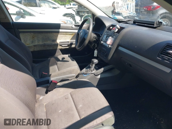 2009 Volkswagen Rabbit S with VIN WVWBB71KX9W026532, listed as a IAAI auction lot 42396191 with 161,660 mi miles and . Bid and sale history available at DreamBid. Image 5.