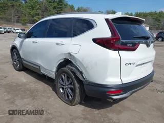 2020 Honda CR-V Touring z VIN 2HKRW2H9XLH623380, wystawiony jako IAAI lot #42039028 z przebiegiem 59 795 mil mil oraz . Historia ofert i sprzedaży dostępna na DreamBid. Obrazek 3.