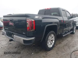2017 GMC Sierra 1500 SLT z VIN 1GTV2NEC5HZ180843, wystawiony jako IAAI lot #41509410 z przebiegiem 89 943 mil mil oraz . Historia ofert i sprzedaży dostępna na DreamBid. Obrazek 4.
