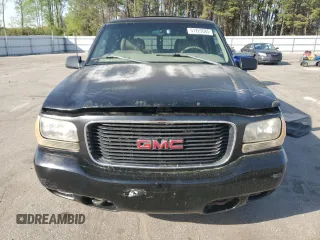 1999 GMC Denali with VIN 1GKEK13R1XR912632, listed as a Copart auction lot 51223085 with 223,201 mi miles and Salvage Title. Bid and sale history available at carsss.com. Image 5.