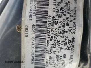 1994 Toyota Camry LE z VIN 4T1SK12E6RU408523, wystawiony jako Copart lot #56314665 z przebiegiem 221 867 mil mil oraz Szkoda całkowita • Salvage title. Historia ofert i sprzedaży dostępna na DreamBid. Obrazek 12.