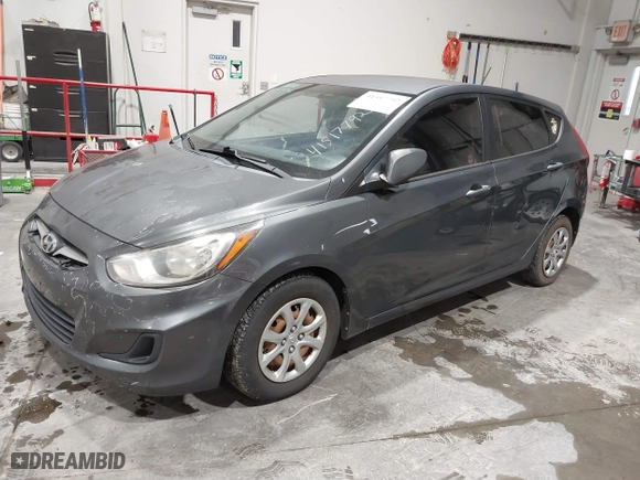 2013 Hyundai Accent GL with VIN KMHCT5AEXDU100208, listed as a IAAI auction lot 41517792 with 164,510 mi miles. Bid and sale history available at carsss.com. Image 2.