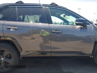2021 Toyota RAV4 Hybrid XSE with VIN 2T3E6RFVXMW016803, listed as a IAAI auction lot 42135617 with 40,898 mi miles and . Bid and sale history available at DreamBid. Image 14.