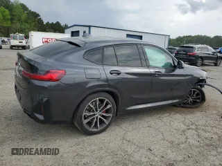 2022 BMW X4 xDrive30i z VIN 5UX33DT02N9J01520, wystawiony jako Copart lot #51488055 z przebiegiem Nie podano mil oraz Szkoda całkowita • Salvage title. Historia ofert i sprzedaży dostępna na DreamBid. Obrazek 3.
