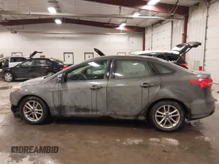 2015 Ford Focus SE with VIN 1FADP3F2XFL342480, listed as a IAAI auction lot 41607487 with 103,530 mi miles. Bid and sale history available at carsss.com. Image 14.