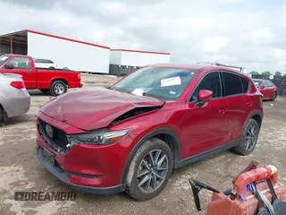 2018 Mazda CX-5 Grand Touring with VIN JM3KFADM7J1357401, listed as a IAAI auction lot 42106012 with 119,420 mi miles and . Bid and sale history available at DreamBid. Image 17.