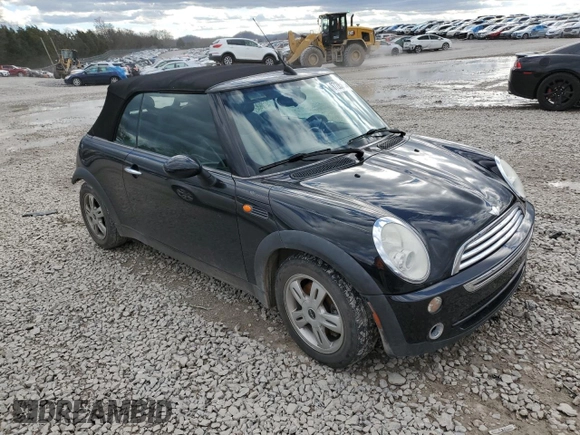 2005 MINI Convertible with VIN WMWRF33485TG11549, listed as a Copart auction lot 87285984 with 58,934 mi miles and Salvage title. Bid and sale history available at DreamBid. Image 4.