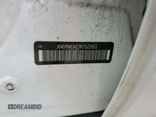 2019 Kia Sportage EX z VIN KNDPNCAC7K7522953, wystawiony jako Copart lot #54906835 z przebiegiem 128 011 mil mil oraz Szkoda całkowita • Salvage title. Historia ofert i sprzedaży dostępna na DreamBid. Obrazek 13.