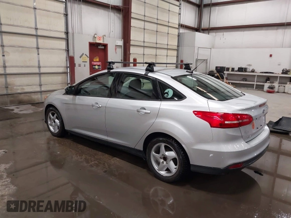 2015 Ford Focus SE with VIN 1FADP3F28FL231684, listed as a IAAI auction lot 41914284 with 100,195 mi miles. Bid and sale history available at carsss.com. Image 3.