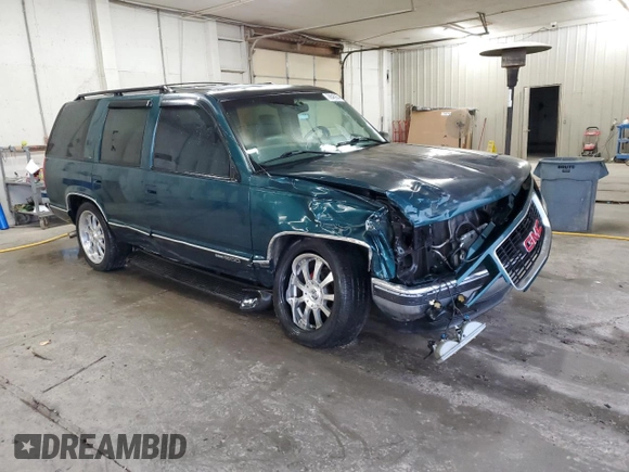 1998 GMC Yukon with VIN 1GKEC13RXWJ731667, listed as a Copart auction lot 78848954 with 202,164 mi miles and Salvage Title. Bid and sale history available at carsss.com. Image 4.