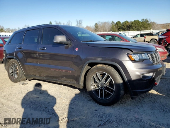 2021 Jeep Grand Cherokee Trailhawk with VIN 1C4RJFLG5MC627975, listed as a Copart auction lot 83080204 with 83,642 mi miles and Salvage Title. Bid and sale history available at carsss.com. Image 4.