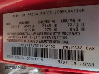 2014 Mazda 3 i Grand Touring with VIN JM1BM1M75E1102762, listed as a IAAI auction lot 41153455 with 179,739 mi miles and . Bid and sale history available at DreamBid. Image 9.