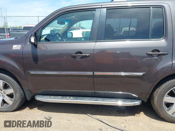 2012 Honda Pilot Touring with VIN 5FNYF4H9XCB083406, listed as a IAAI auction lot 42107651 with 217,678 mi miles. Bid and sale history available at carsss.com. Image 15.