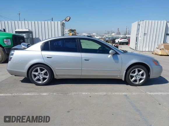 2002 Nissan Altima SE with VIN 1N4BL11E72C169164, listed as a IAAI auction lot 41992002 with 100,211 mi miles. Bid and sale history available at carsss.com. Image 13.