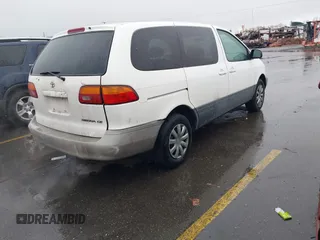 1999 Toyota Sienna CE with VIN 4T3ZF19C0XU169353, listed as a IAAI auction lot 41534196 with 189,783 mi miles. Bid and sale history available at carsss.com. Image 4.