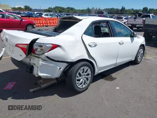 2018 Toyota Corolla L with VIN 2T1BURHE0JC090596, listed as a IAAI auction lot 42655247 with Not provided miles and . Bid and sale history available at DreamBid. Image 4.