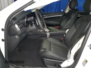 2023 Genesis G70 2.0T with VIN KMTG34TAXPU131832, listed as a Copart auction lot 44111124 with 3,203 mi miles and Non Repairable. Bid and sale history available at DreamBid. Image 7.