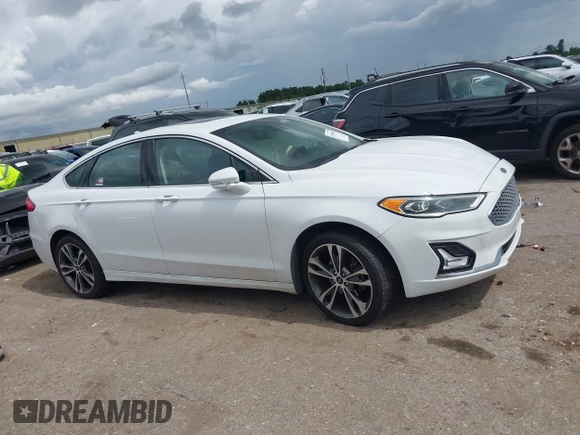 2020 Ford Fusion Titanium с VIN 3FA6P0D98LR151810, выставлен на аукционе IAAI как лот 42590902 с пробегом 76 624 миль миль и . История ставок и продаж доступна на DreamBid. Изображение 13.