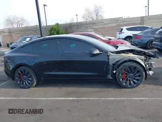 2023 Tesla Model 3 Performance z VIN 5YJ3E1EC3PF716085, wystawiony jako IAAI lot #41911684 z przebiegiem 45 184 mil mil oraz . Historia ofert i sprzedaży dostępna na DreamBid. Obrazek 14.