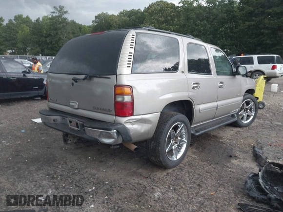 2002 Chevrolet Tahoe LT with VIN 1GNEC13Z62J233110, listed as a IAAI auction lot 42460607 with 329,196 mi miles and . Bid and sale history available at DreamBid. Image 4.