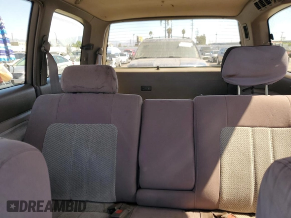 1992 Mazda MPV z VIN JM3LV5222N0453058, wystawiony jako Copart lot #72283634 z przebiegiem 174 084 mil mil oraz Szkoda całkowita • Salvage title. Historia ofert i sprzedaży dostępna na DreamBid. Obrazek 10.